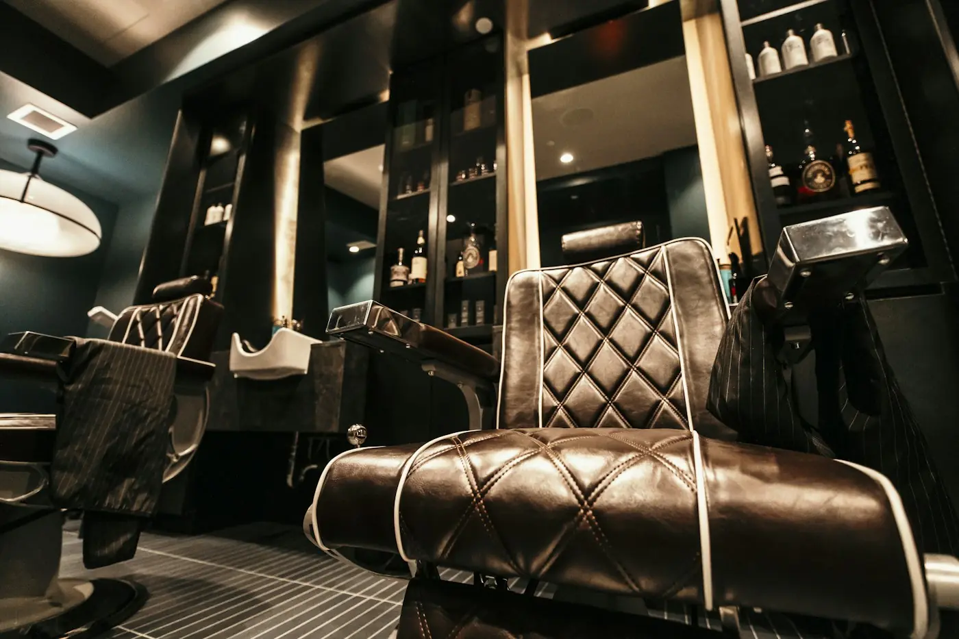 A row of leather barber chairs